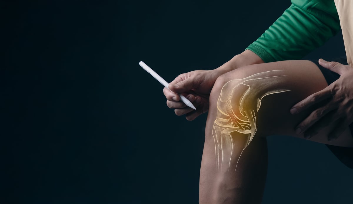Rodilla con superposición radiográfica destacando los ligamentos de la articulación
